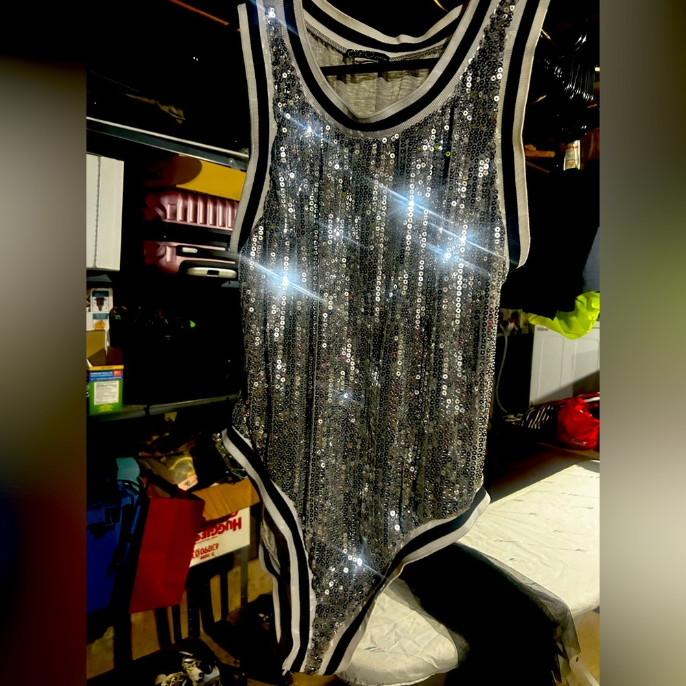 Sparkly bodysuit.